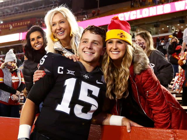 <p>David K Purdy/Getty</p> Brock Purdy celebrates with his mother Carrie Purdy, and sister Whittney Purdy after winning over the Oklahoma Sooners on October 3, 2020.