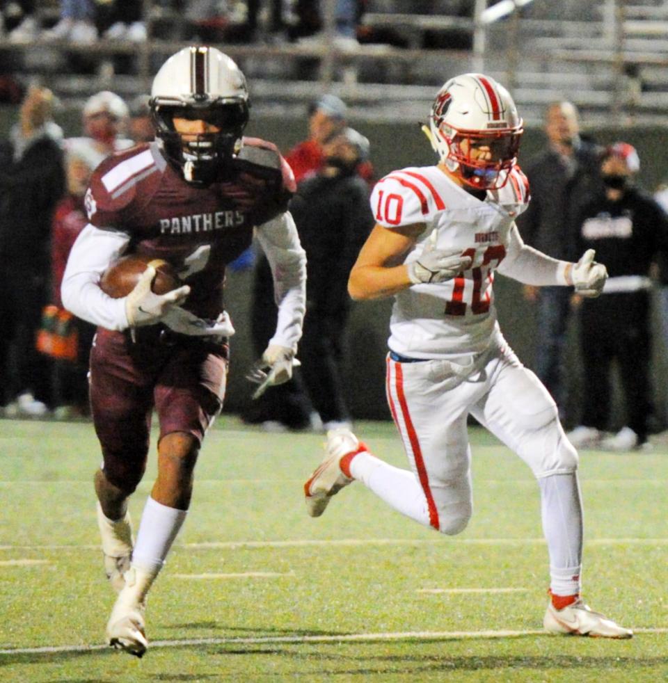 Seymour's David Charo (left) runs after the catch against Muenster.
