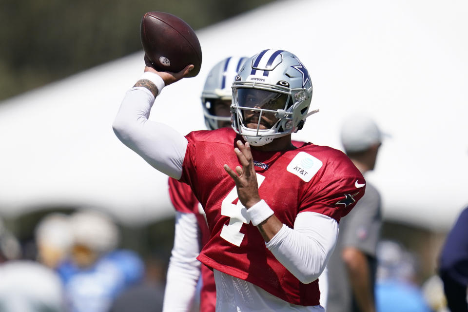 Dallas Cowboys quarterback Dak Prescott (4) participates in drills during a combined NFL practice at the Los Angeles Rams' practice facility in Costa Mesa, Calif. Thursday, Aug. 18, 2022. (AP Photo/Ashley Landis)