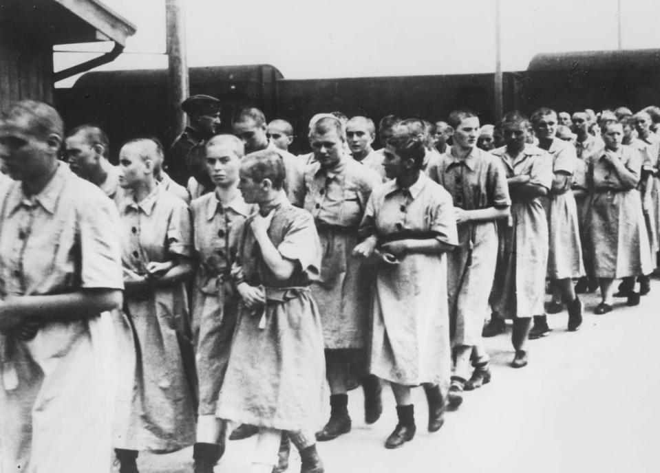 <div class="inline-image__caption"><p>A photo of women deemed fit for work, taken in May 1944 in the Auschwitz-Birkenau extermination camp, in Oswiecim, after the camp absorption process.</p></div> <div class="inline-image__credit">AFP via Getty </div>