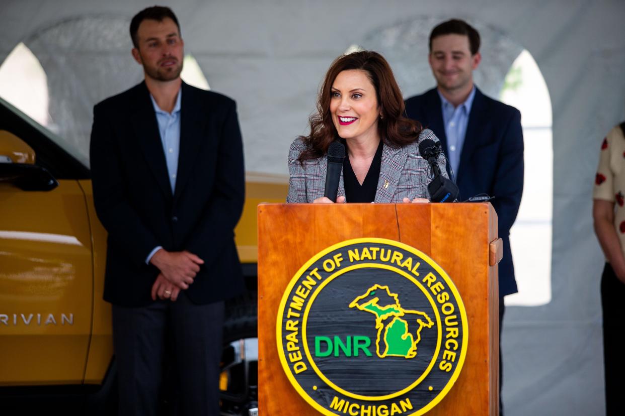 Gov. Gretchen Whitmer speaks during the launch of Michigan State Park's first electric vehicle charging stations Thursday, May 26, 2022, at Holland State Park. The charging station comes in partnership with EV Manufacturer Rivian, Adopt-a-Charger and the State of Michigan. 