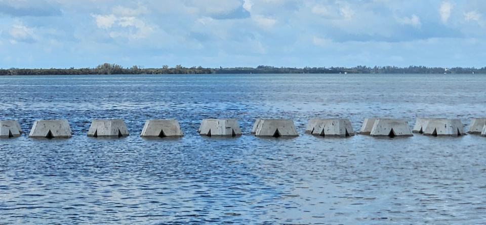 The Florida Department of Transportation is placing more than 800 wave attenuation devices along the south Skyway Fishing Pier access road to protect it from erosion.