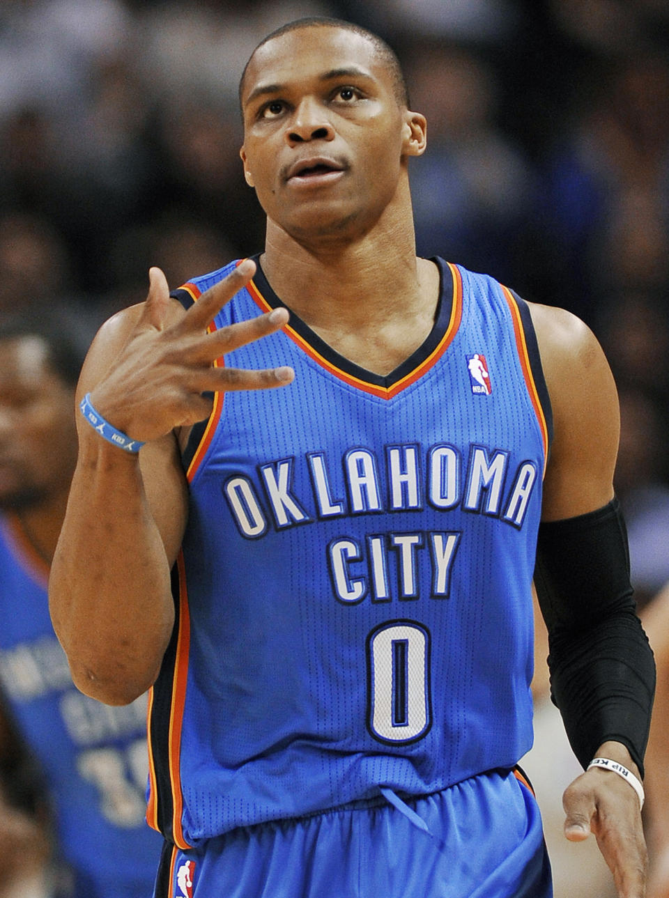 FILE - In this Dec. 21, 2013, file photo,, Oklahoma City Thunder guard Russell Westbrook celebrates a 3-point basket during the first half of an NBA basketball game against the San Antonio Spurs in San Antonio. Yes, the Thunder are rolling without him, but Westbrook, when healthy, is one of the most dynamic players in the NBA. He has been out since late December after having surgery on his right knee. (AP Photo/Darren Abate, File)