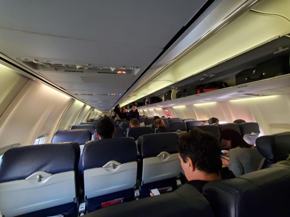 Passengers boarding plane
