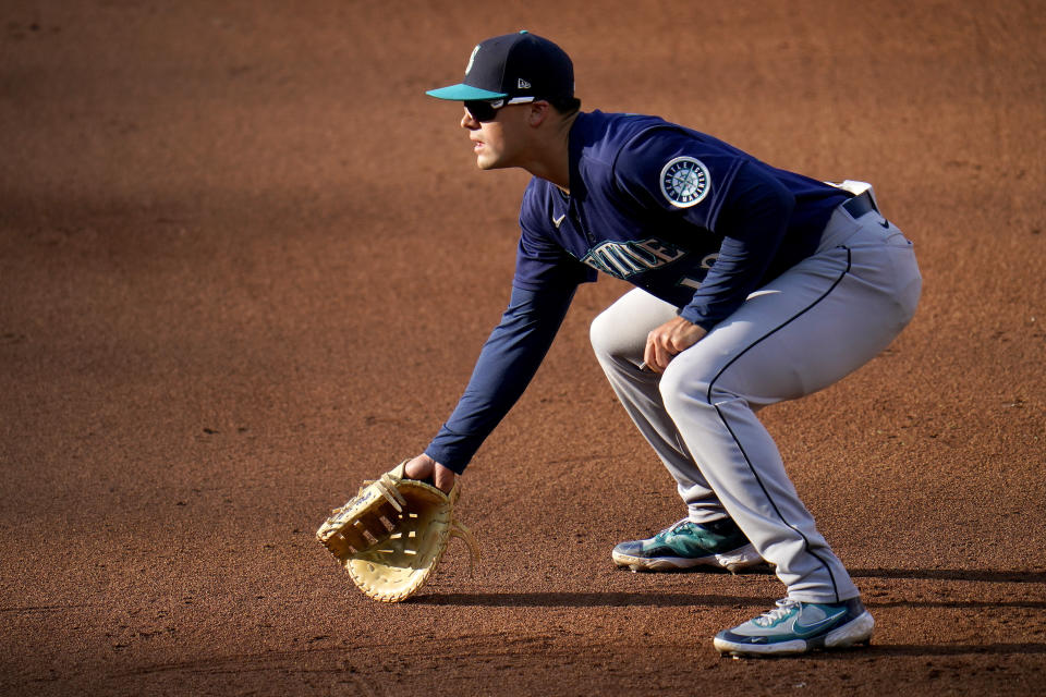 FILE - Seattle Mariners first baseman Evan White waits for a pitch to a Baltimore Orioles batter during the seventh inning of the first game of a baseball doubleheader April 13, 2021, in Baltimore. The Atlanta Braves traded White and Tyler Thomas to the Los Angeles Angels on Friday, Dec. 8, 2023, for David Fletcher and Max Stassi. (AP Photo/Julio Cortez)