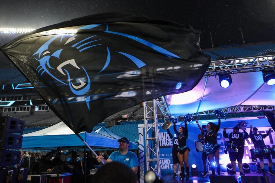 Celebration ensues on the main stage as the Panthers pick quarterback Bryce Young as the number one pick during in the NFL Draft during a fan watch party at Bank of America Stadium on Thursday, April 27, 2023. Melissa Melvin-Rodriguez/mrodriguez@charlotteobserver.com