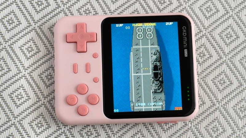 The GKD Mini Plus handheld turned sideways so the device's screen better accommodates Tate Mode games.