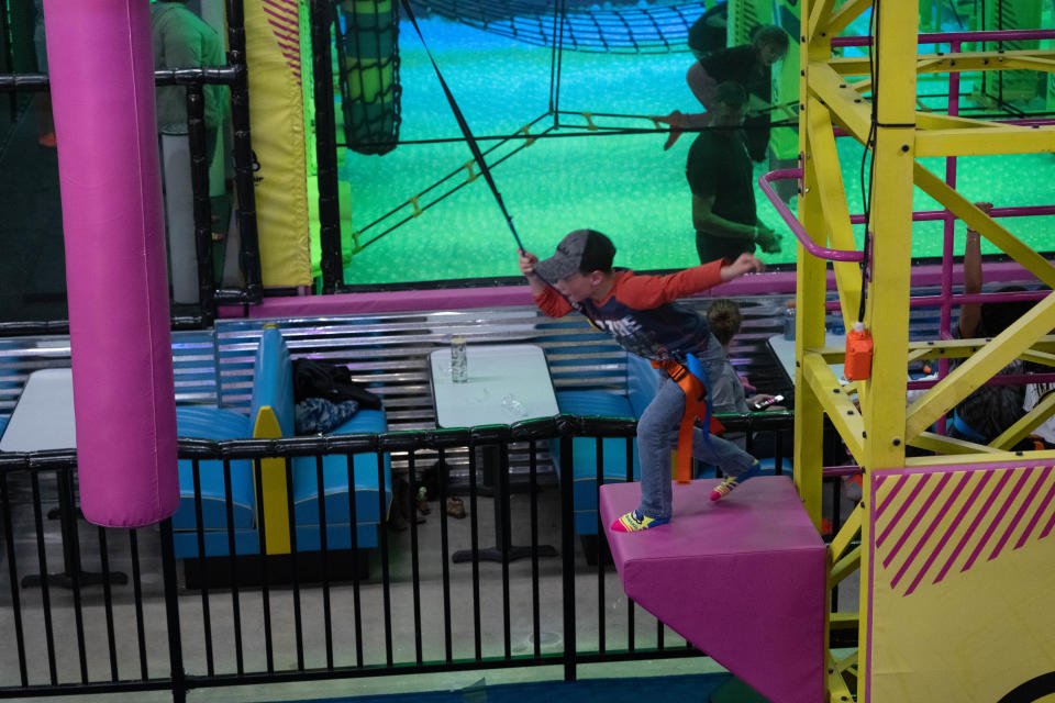 A young boy prepares to do the leap of faith at Urban Air Adventure Park in Amarillo.