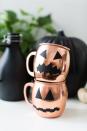 <p>Who needs the mess and manual labor of pumpkin carving when you can decorate your drink? These Moscow mule mugs are like a stylish adult-only version of pumpkins, thanks that coppery sheen. Get the tutorial from <a href="https://sugarandcloth.com/diy-halloween-glassware-decals/" rel="nofollow noopener" target="_blank" data-ylk="slk:Sugar & Cloth;elm:context_link;itc:0;sec:content-canvas" class="link ">Sugar & Cloth</a>. </p><p><a class="link " href="https://www.amazon.com/Moscow-Mule-Copper-Mugs-Set/dp/B01LVYR3WA?tag=syn-yahoo-20&ascsubtag=%5Bartid%7C10057.g.2554%5Bsrc%7Cyahoo-us" rel="nofollow noopener" target="_blank" data-ylk="slk:BUY NOW;elm:context_link;itc:0;sec:content-canvas">BUY NOW</a> <strong><em>Moscow Mule Mug Set, $30</em></strong></p>