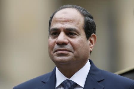 Egyptian President Abdel Fattah al-Sisi attends a military ceremony in the courtyard of the Invalides in Paris, November 26, 2014. REUTERS/Charles Platiau