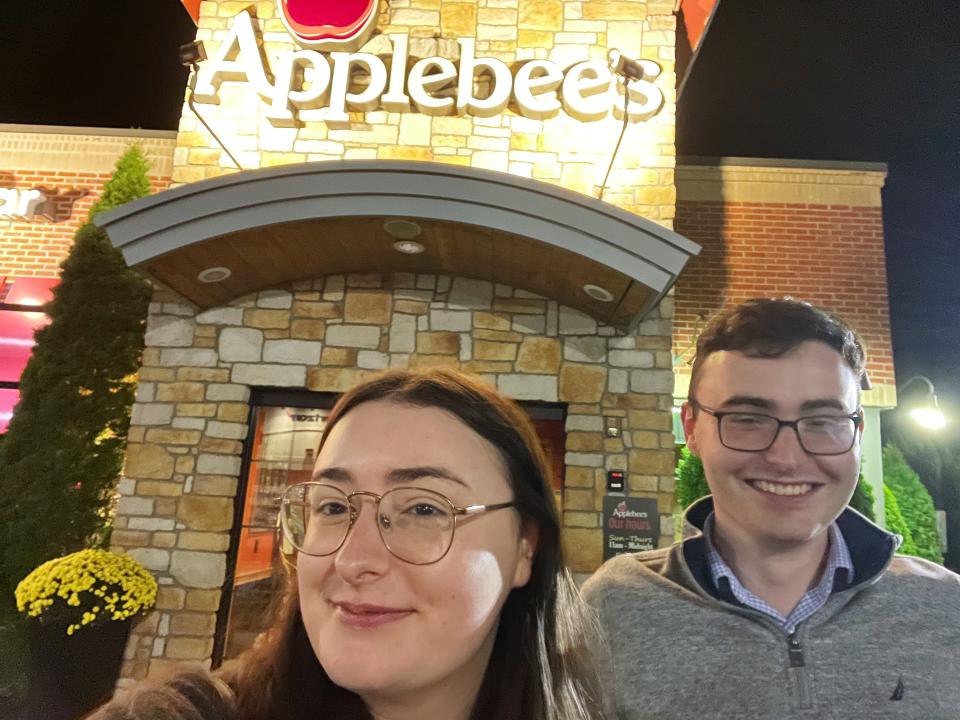 author and guest outside applebees