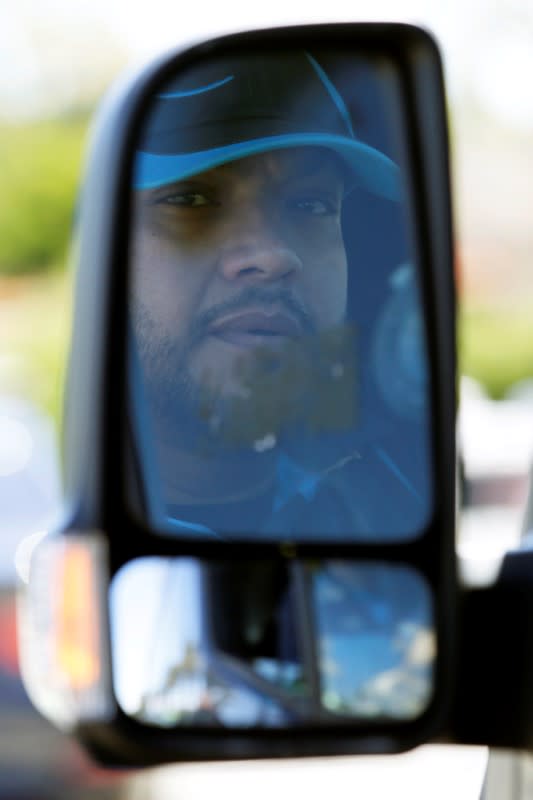 Joseph Alvarado makes deliveries for Amazon during the outbreak of the coronavirus disease