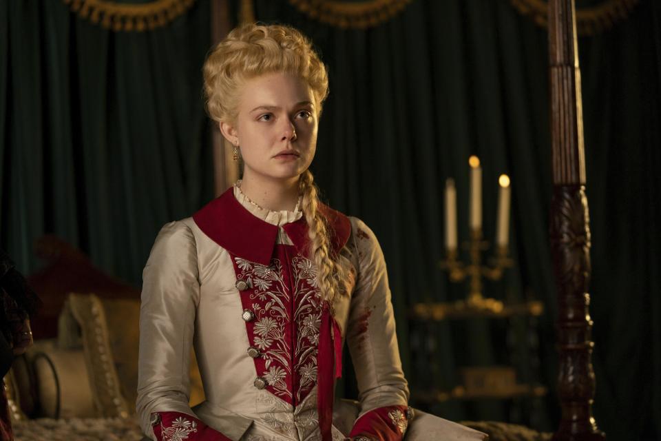 This image released by Hulu shows Elle Fanning in a scene from "The Great." Fanning was nominated for an Emmy Award for best lead actress in a comedy series. (Gareth Gatrell/Hulu via AP)