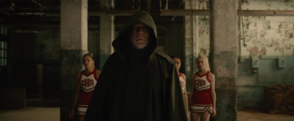 David Dunn (Bruce Willis) is Philadelphia's heroic "Overseer" who saves a bunch of cheerleaders in "Glass."