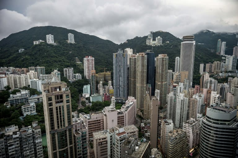 Property prices in Hong Kong, famous for its sky-high rent and super-rich tycoons, have more than doubled in 6 years due to record low interest rates and a flood of wealthy buyers from mainland China