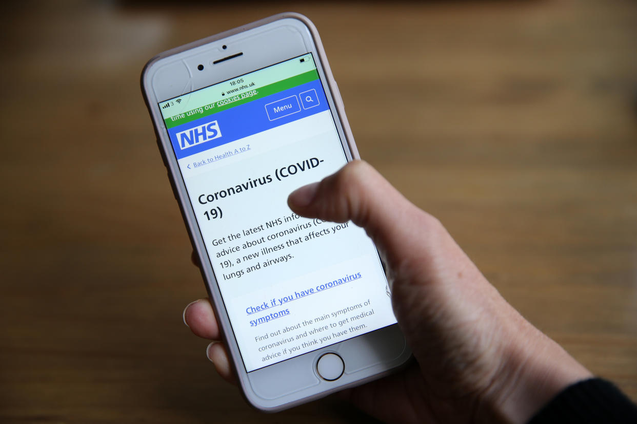 A person using the NHS app on a mobile phone, as the UK continues in lockdown to help curb the spread of the coronavirus. Picture date: Monday April 27, 2020. 