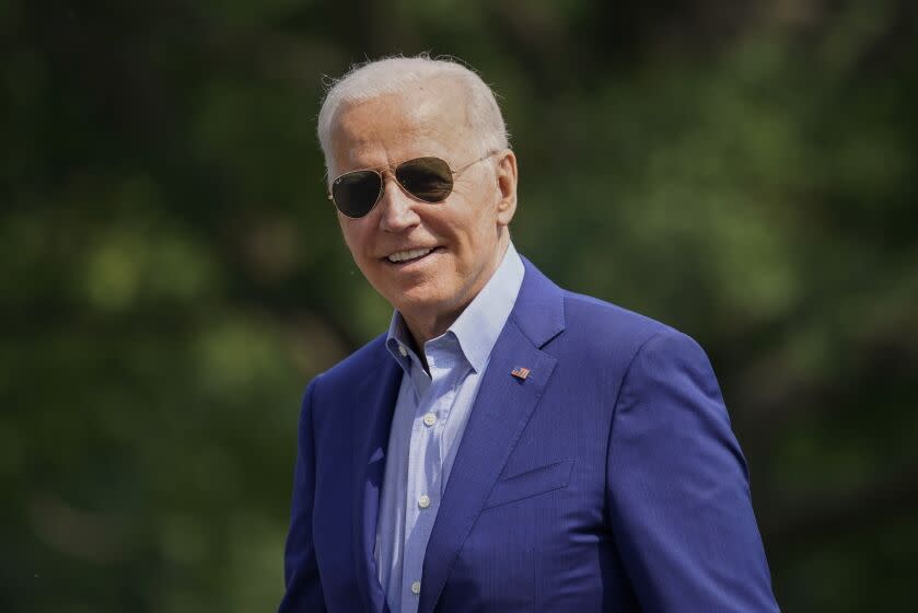 President Joe Biden walks on the South Lawn of the White House after stepping off Marine One, Sunday, July 25, 2021, in Washington. Biden is returning to Washington after spending the weekend in Delaware. (AP Photo/Pablo Martinez Monsivais)