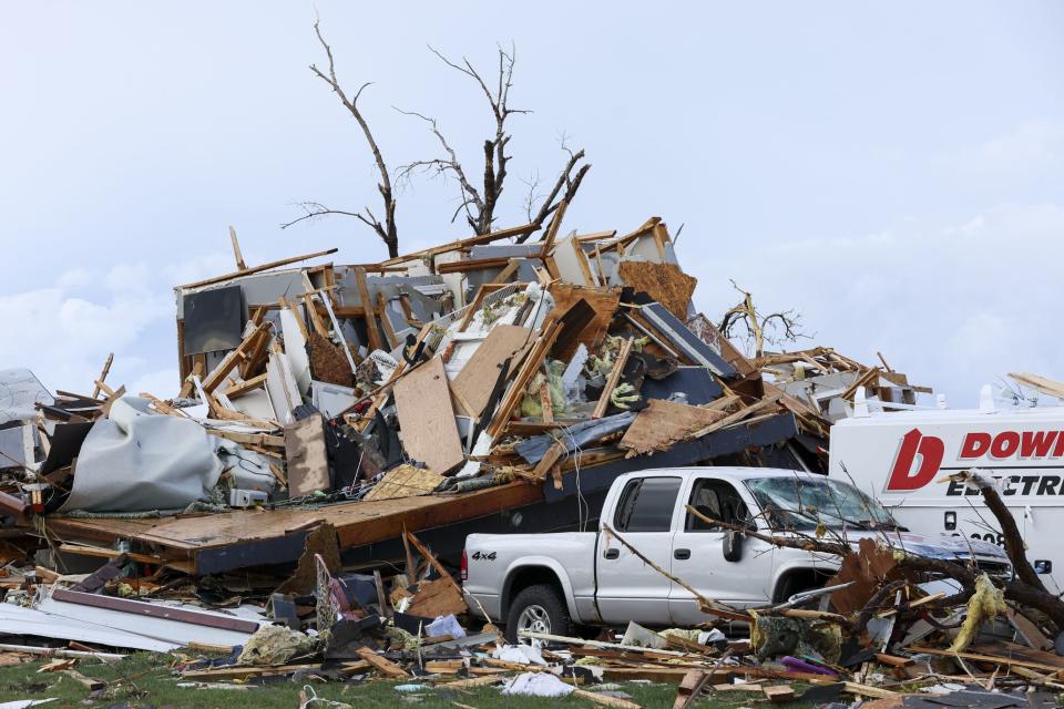 Damage is seen to home after it was leveled by a tornado near Omaha, Neb., on Friday, April 26, 2024. (Nikos Frazier/Omaha World-Herald via AP)