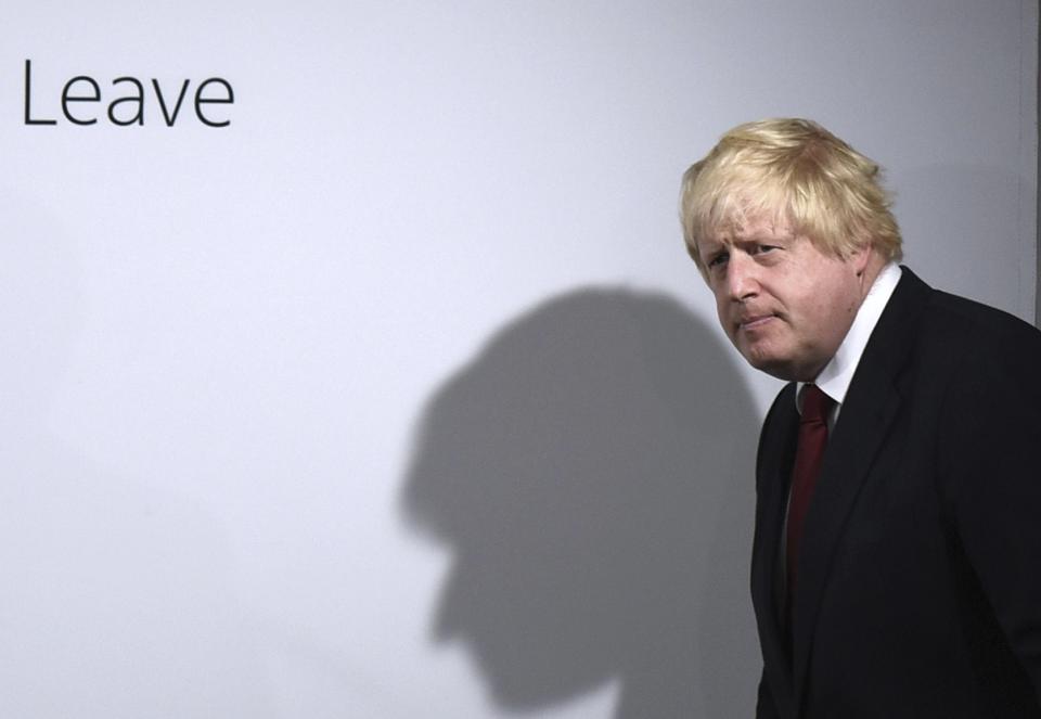 FILE - In this Friday, June 24, 2016 file photo, Vote Leave campaigner Boris Johnson arrives for a press conference at Vote Leave headquarters in London, He was the mayor who reveled in the glory of hosting the 2012 London Olympics, and the man who led the Conservatives to a whopping election victory on the back of his mission to “get Brexit done.” But Boris Johnson’s time as prime minister was marred by his handling of the coronavirus pandemic and a steady stream of ethics allegations. (Mary Turner/Pool via AP, File)