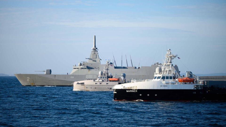 The unmanned surface vessels Ranger and Mariner sail alongside Japan's Mogami-class frigate JS Kumano on Sept. 27, 2023. (MC2 Jesse Monford/U.S. Navy)