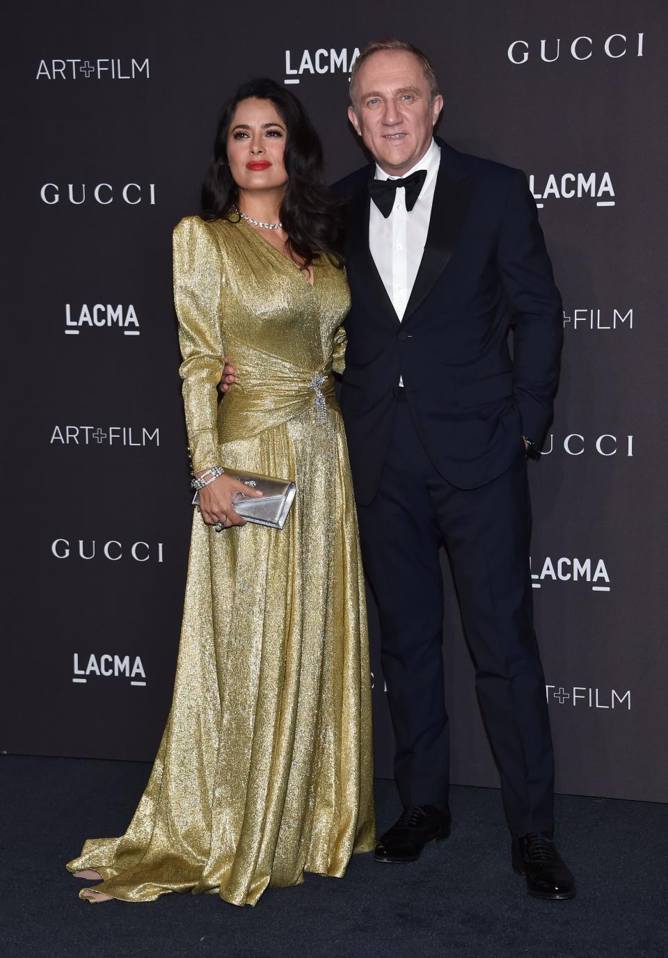 Actress Salma Hayek Pinault and husband French businessman Francois-Henri Pinault arrive for the 2018 LACMA Art+Film Gala at the Los Angeles County Museum of Art in Los Angeles, California, on November 3, 2018. (Photo by Chris Delmas / AFP)        (Photo credit should read CHRIS DELMAS/AFP via Getty Images)