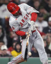 Los Angeles Angels outfielder Mike Trout snaps his bat on a foul ball during the ninth inning of the team's baseball game against the Boston Red Sox, Friday, April 12, 2024, in Boston. (AP Photo/Charles Krupa)
