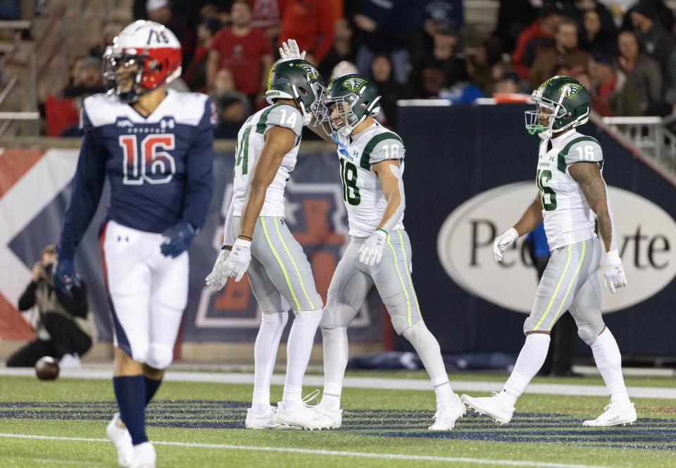 Orlando Guardian wide receiver Andrew Jamiel (18) celebrates his touchdown reception with teammates against the Houston Roughnecks in the fourth quarter at TDECU Stadium on Feb. 18, 2023.