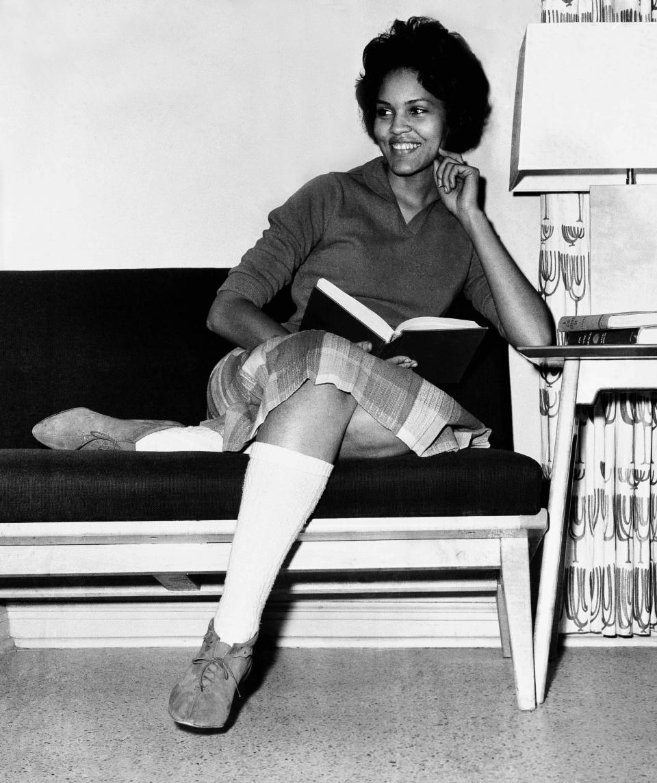 Student Charlayne Hunter, 18, the first Black woman to enter the University of Georgia, relaxes momentarily from her studies in her dormitory in Athens, Ga., on Jan. 11, 1961.