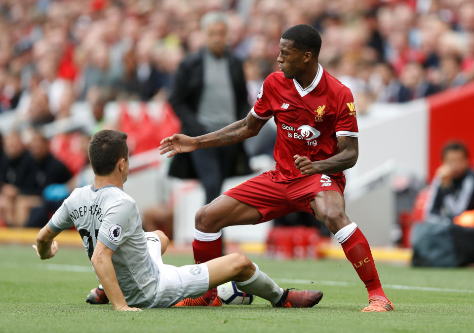 <p>Liverpool’s Georginio Wijnaldum tries to get past Ander Herrera</p>