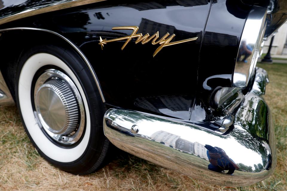 A 1960 Plymouth Fury, a part of the Hagerty Learning Garage, sits on the lawn of the Detroit Institute of Arts in Detroit on Thursday, Aug. 2, 2022 during a preview of the Detroit Concours d'Elegance classic car show happening in September.