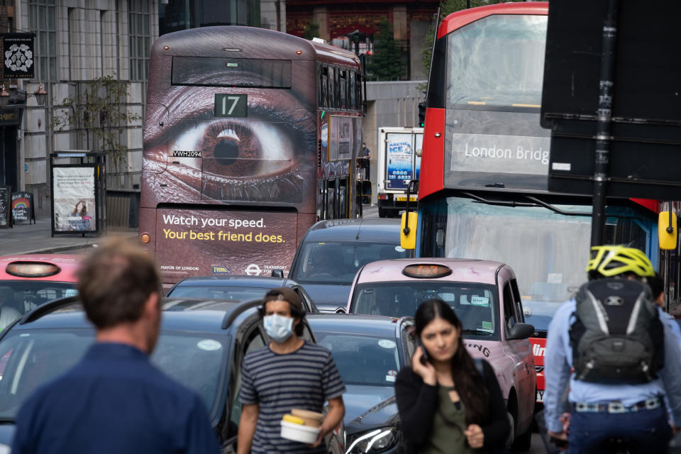 Pedestrians and busy traffic on the Farringdon Road in the City of London with a London bus carrying an ad about speeding in the capital, on 16th September 2020, in London, England. (Photo by Richard Baker / In Pictures via Getty Images)