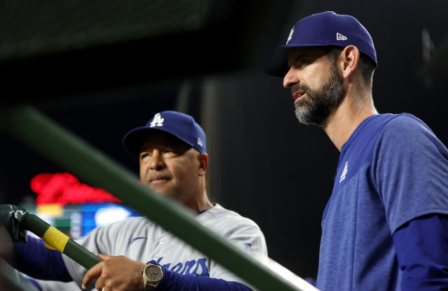 Chicago Cubs' Randall Simon, left and Kenny Lofton, right, laugh