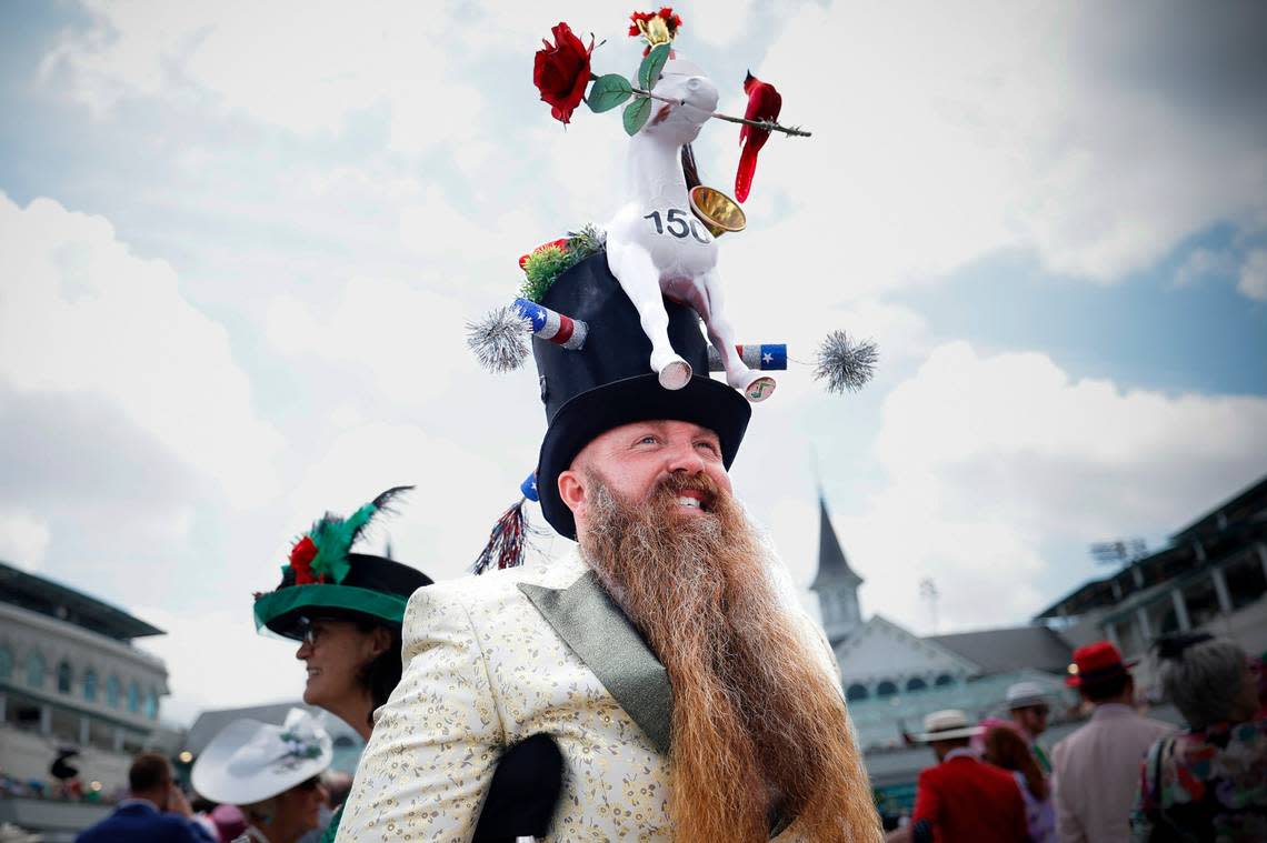 Garey Faulkner of Cincinnati stands near the paddock before the 150th running of the Kentucky Derby at Churchill Downs on Saturday.