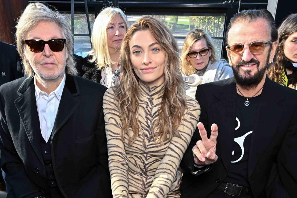 <p>Stephane Cardinale - Corbis/Corbis via Getty</p> Paul McCartney, Paris Jackson and Ringo Starr at the Stella McCartney fashion show on March 4, 2024.