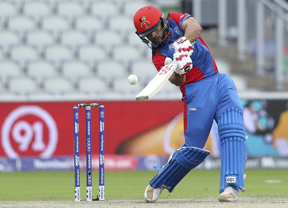 Afghanistan's captain Gulbadin Naib bats during the Cricket World Cup match between England and Afghanistan at Old Trafford in Manchester, England, Tuesday, June 18, 2019. (AP Photo/Rui Vieira)