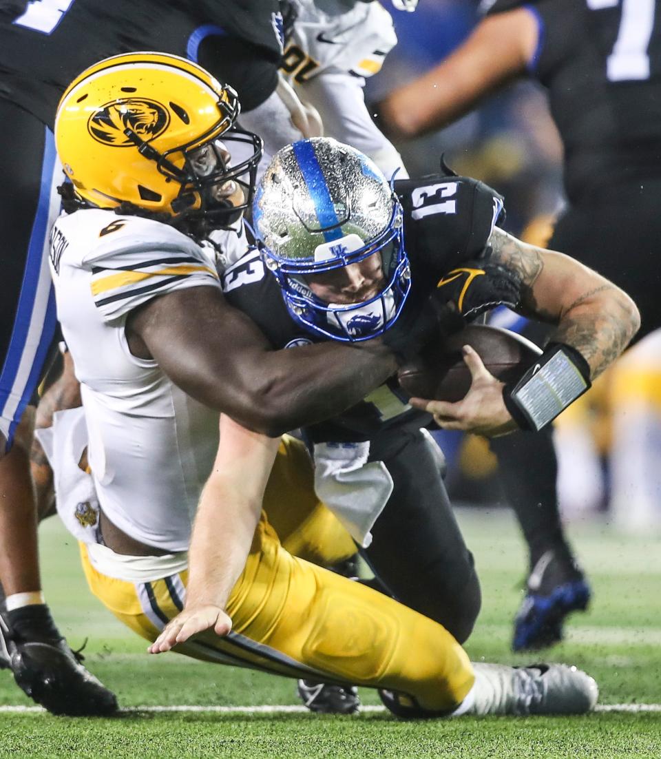 Missouri Tigers defensive lineman Darius Robinson (6) sacks Kentucky Wildcats quarterback Devin Leary (13) as Mizzou manhandled UK 38-21. Oct. 14, 2023.