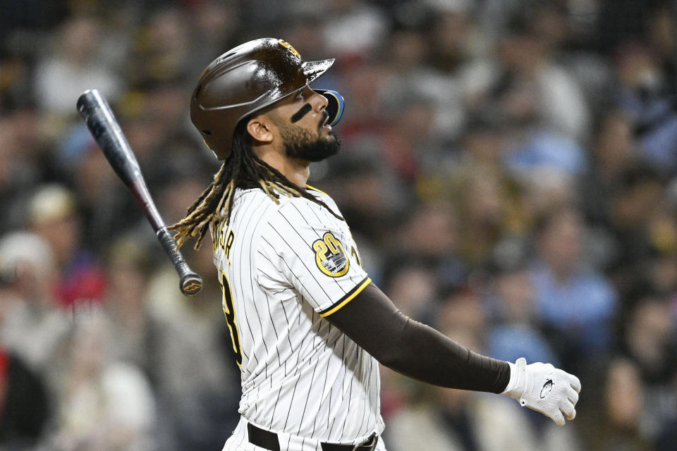 San Diego Padres' Fernando Tatis Jr. hits a solo home run during the sixth inning of a baseball game against the St. Louis Cardinals, Monday, April 1, 2024, in San Diego. (AP Photo/Denis Poroy)