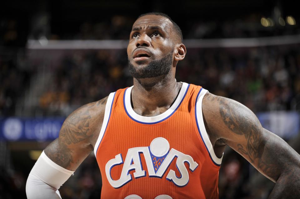 LeBron James looks up, while we look over his shoulder to see who's coming. (Getty Images)