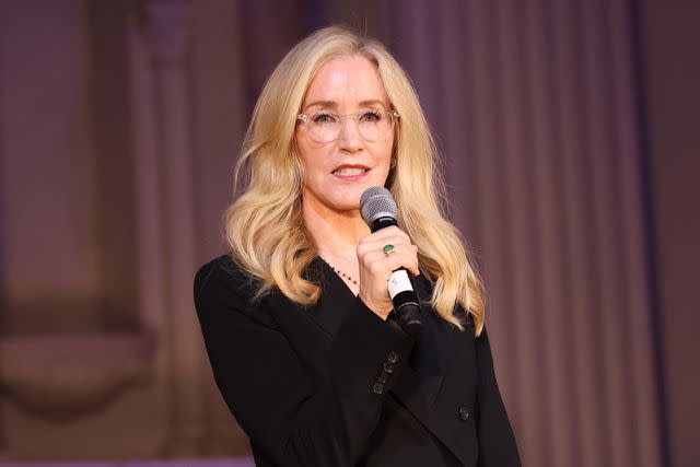 <p> Amy Sussman/Getty </p> Felicity Huffman speaks at A New Way Of Life, women re-entry program, gala hosted by her and William H. Macy on December 3, 2023 in Los Angeles, California.
