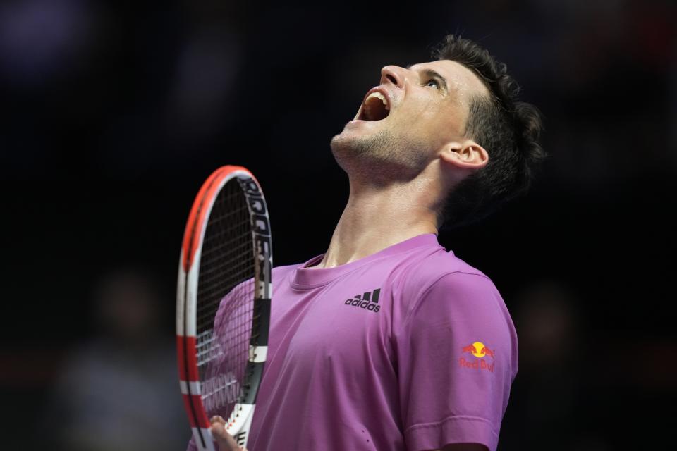 Dominic Thiem of Hawks, reacts after missing a ball against Felix Auger-Aliassime of Kites, during a match of the World Tennis League at Coca-Cola Arena, in Dubai, United Arab Emirates, Thursday, Dec. 22, 2022. (AP Photo/Kamran Jebreili)