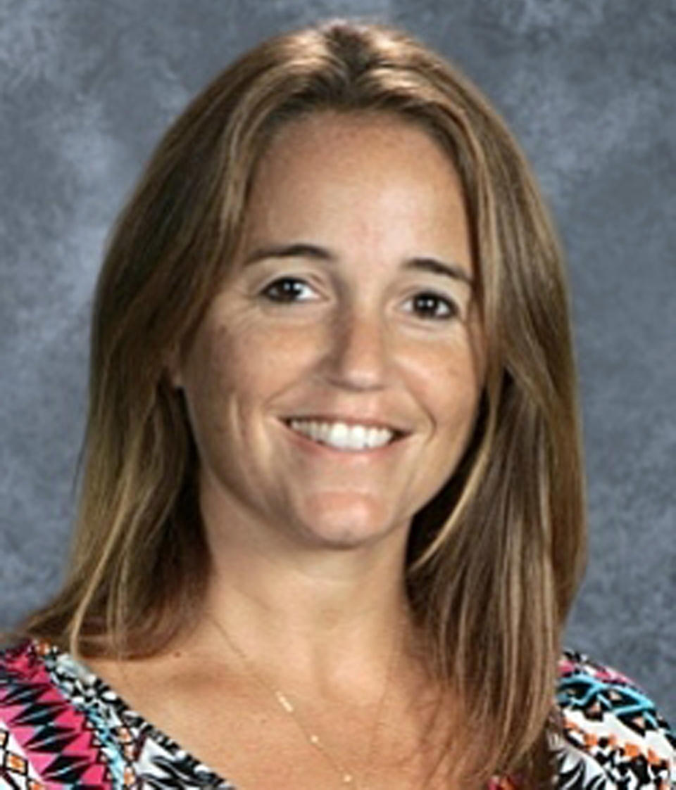 <p>This undated employee identification photo provided by the Manhattan Beach Unified School District shows Sandy Casey, who was one of the people killed in Las Vegas after a gunman opened fire on Sunday, Oct. 1, 2017, at a country music festival. (Manhattan Beach Unified School District via AP) </p>