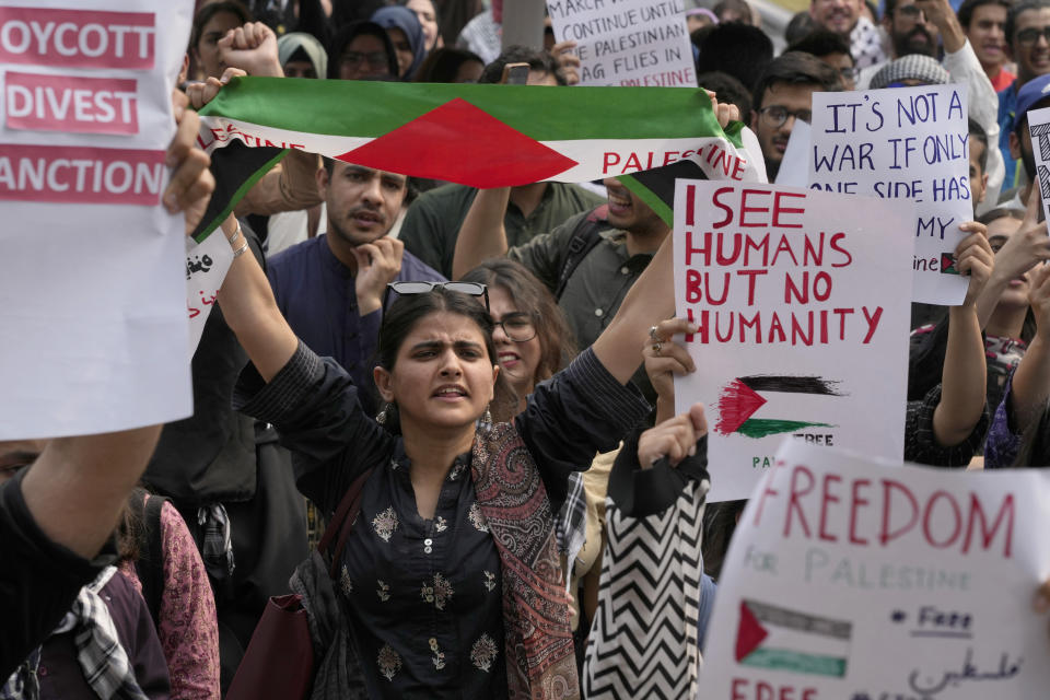 University students take part in rally against the Israeli airstrikes on Gaza and to show solidarity with Palestinian people, in Lahore, Pakistan, Friday, May 10, 2024. (AP Photo/K.M. Chaudary)