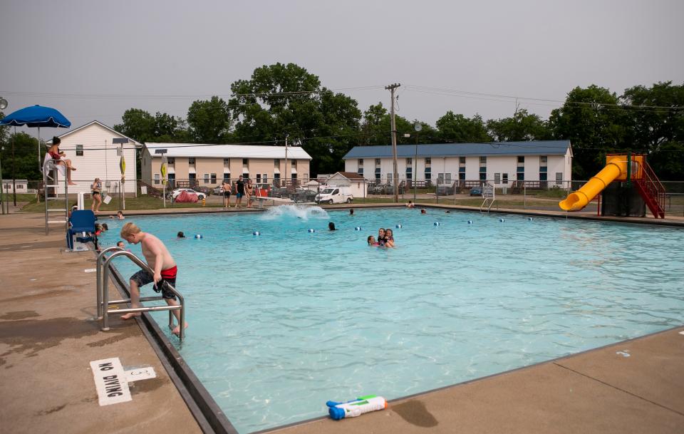 People spend time in the cooling off at the Bremen pool on June 5, 2023, in Bremen, Ohio.