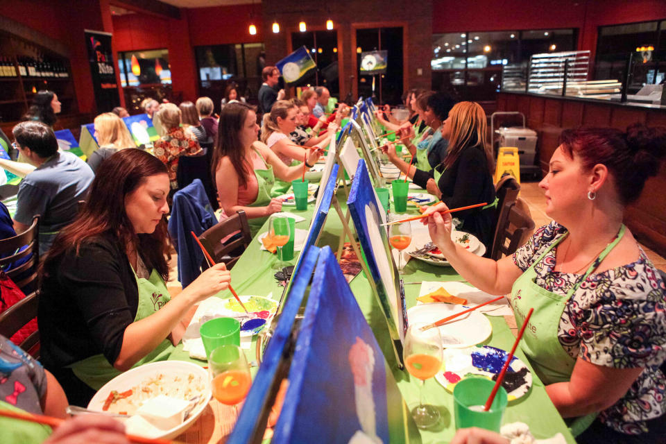 Paint Nite offers a party atmosphere at restaurants for amateur painters, like this class at Bertucci's in Wilmington.