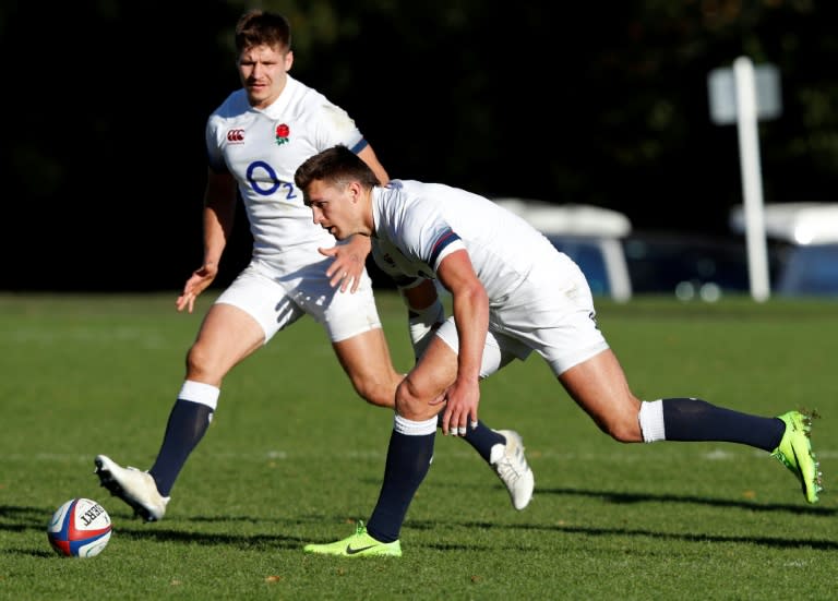 England's Piers Francis (L) and Henry Slade attend a training session at Pennyhill Park in Bagshot, west of London, on November 23, 2017