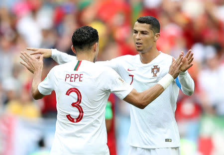 Soccer Football - World Cup - Group B - Portugal vs Morocco - Luzhniki Stadium, Moscow, Russia - June 20, 2018 Portugal's Cristiano Ronaldo and Pepe celebrate after the match REUTERS/Carl Recine