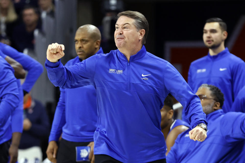 Saint Louis coach Travis Ford reacts to a call during the first half of the team's NCAA college basketball game against Auburn on Sunday, Nov. 27, 2022, in Auburn, Ala. (AP Photo/Butch Dill)
