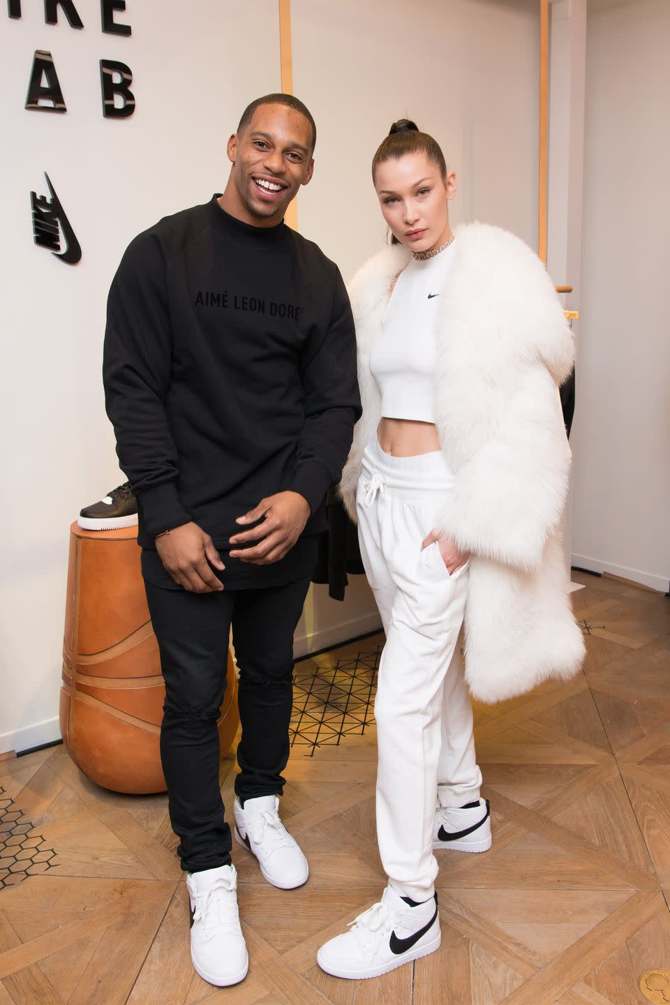 <p>In a white fur coat, Nike crop top, white briefs and sweatpants and Riccardo Tisci x Nike Dunks at the NikeLab opening in NYC with Victor Cruz.</p>