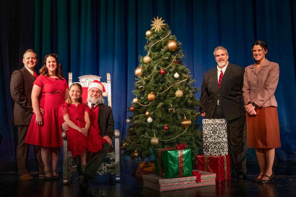 The cast of "Miracle on 34th Street - The Musical" is, from left, Fred Gailey (played by DJ Rudd), Doris Walker (Lindsey Rudd), Susan Walker (Jane Holzmacher), Kris Kringle (Don Howard), R.H. Macy (Jim Leach) and M. Shellhammer (Britt Holzmacher).