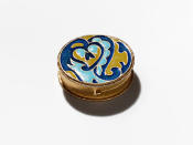 <p>This blue paisley compact was available in both a perfume solid and a powder, and there was a matching refillable lipstick case. Again, the pattern on compact echoes the pattern that was on gift sets and promotional holiday materials of that time. This compact also served as inspiration for the 2013 Estée Lauder Mad Men collection. (Photo: Henry Leutwyler)</p>